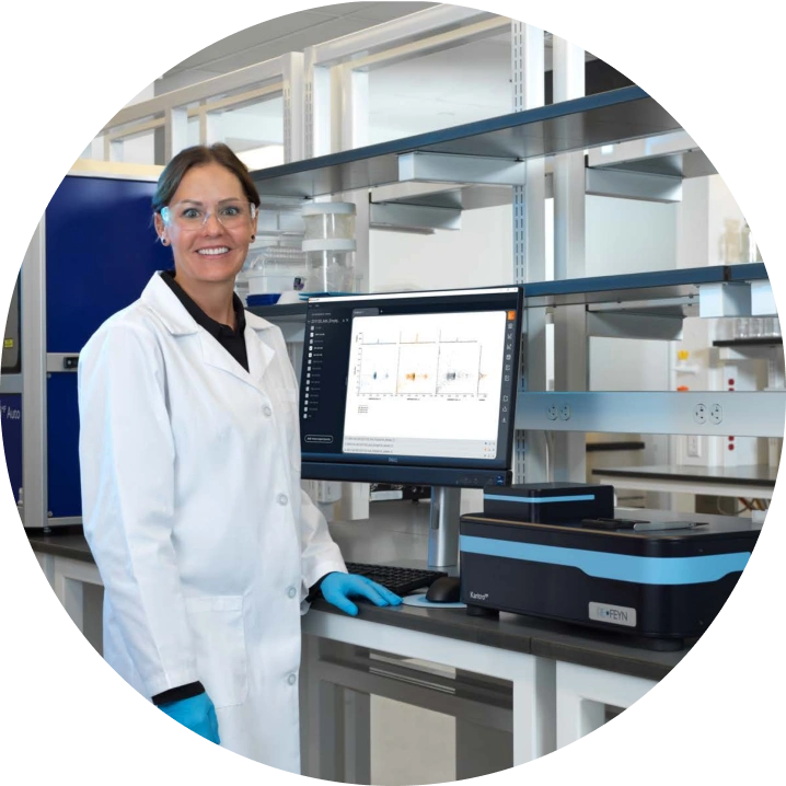 Scientist beside KaritroMP instrument